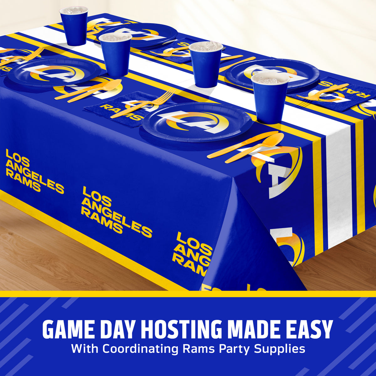 Los Angeles Rams themed party table setting with a printed tablecloth, matching plates, cups, and utensils, shown on a table with a promotional banner at the bottom that says "Game Day Hosting Made Easy".
