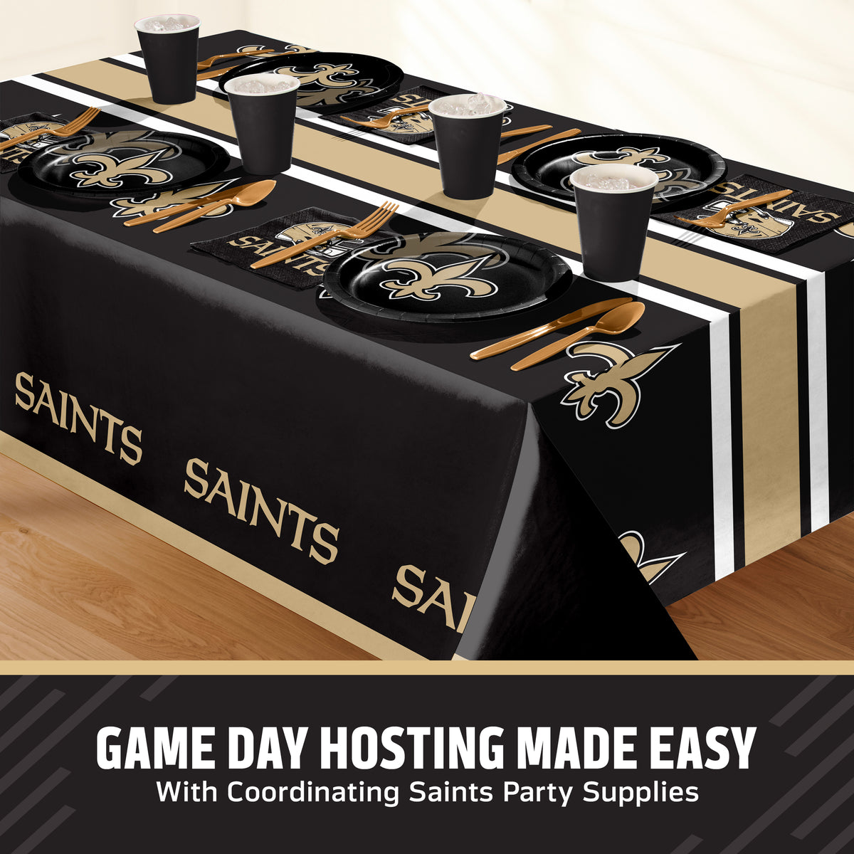New Orleans Saints themed party table setting with a printed tablecloth, matching plates, cups, and utensils, shown on a table with a promotional banner at the bottom that says "Game Day Hosting Made Easy".